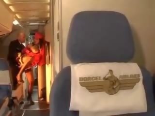 Libidinous stewardess rides a putz nang both holes